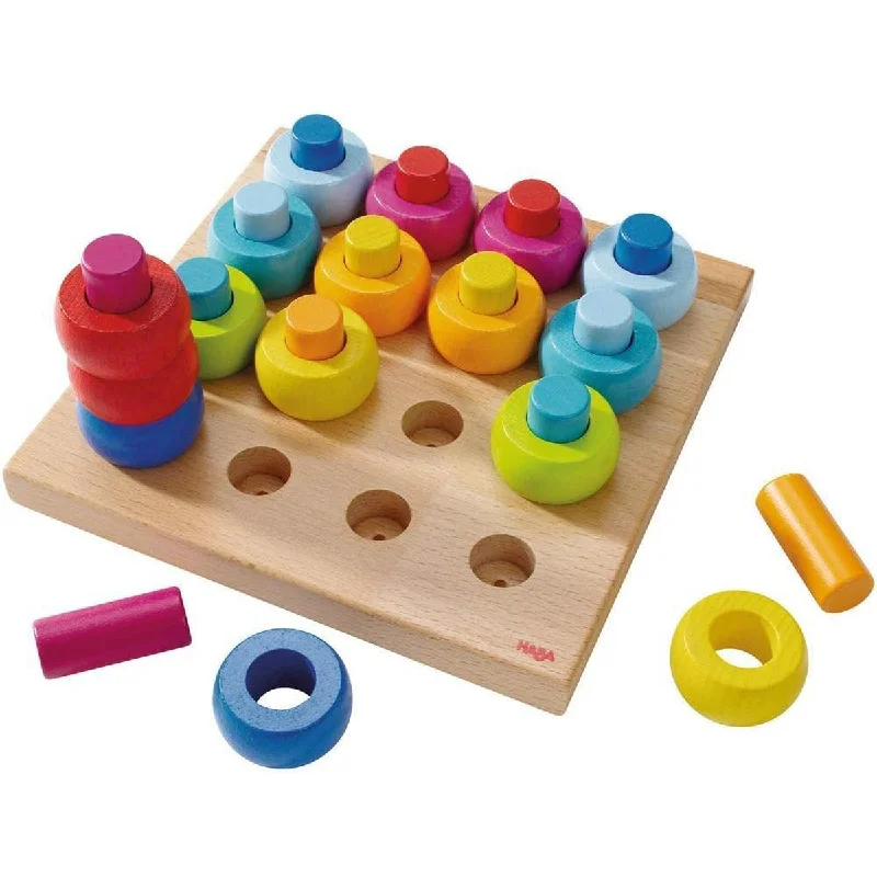 Haba rainbow whirls pegging game